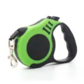 Green and black automatic retractable dog leash with ergonomic handle and bone design - Bone Green