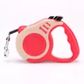 Automatic red retractable dog leash with beige side panel and decorative bone patterns - Bone Beige Red