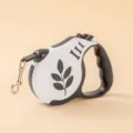 Automatic retractable black and white dog leash with leaf pattern and ergonomic handle - 3m Card Pack / Leaf Black