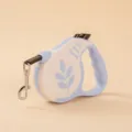 Automatic retractable dog leash in blue and white with a decorative leaf print design - 3m Card Pack / Leaf Light Blue