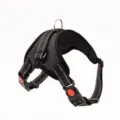 Detail view of a black reflective dog harness with adjustable straps and secure D-ring - XS / K7 Black
