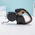 Double laisse rétractable noire pour chien avec silhouette mignonne et boutons de commande - Beige