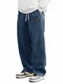 Close-up detail of loose blue corduroy casual pants for men with drawstring waist - S / Bottoms / Navy Blue
