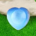 Blue heart-shaped translucent crystal worry stone for healing meditation and decor - Opal (Synthetic)