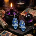 Close-up of coffin-shaped gothic earrings with mystical moon and stars graphic design - Peacock Blue Coffin Moon Star Style (WEH3438)