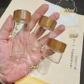 Mini glass airtight jars with wood grain lids in 10ml, 20ml and 30ml capacities. - L