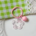 Cute pink acrylic star keychain featuring a transparent pendant and matching bell accessory. - Transparent Pink Star Keychain