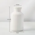 Vase en céramique blanche minimaliste, 12,5 cm de hauteur et 7 cm de diamètre - Style Petit Biberon