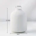 Petit vase décoratif en céramique blanche minimaliste, 11,5x8cm avec une finition imperméable mate - Style Petit Plat