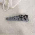 Korean style grey knitted hair clip with rhinestone bow, elegant side bang accessory for women. - Light Gray Bowknot