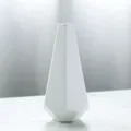 Vase à fleurs moderne et minimaliste en céramique blanche pour une décoration élégante. - Blanc