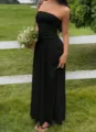 Elegant black strapless maxi dress with ruffled waist in a summer outdoor setting - S / Dresses / Black
