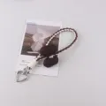Cute leopard print braided phone strap keychain with brown and white design and heart clasp. - Dark Coffee