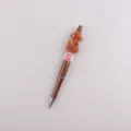Christmas beaded pen with cute silicone gingerbread man, fluffy pom-pom and snowflake bead. - Bow Tie Gingerbread Man