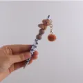 Cute brown poodle silicone beaded gel pen with fluffy pom-pom charm and paw print barrel. - Brown
