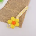 Niedliche geflochtene Handykette mit gelbem Blumenanhänger und Schlüsselband für Frauen. - Gelb