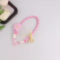 Handgemachte rosa geflochtene Handykette mit Stern und gelber Schleife süßer Taschenanhänger - Rosa