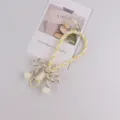 Cordino per cellulare intrecciato portachiavi con fiocco e pon pon giallo e bianco - Giallo