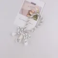 Laccetto per telefono intrecciato minimalista portachiavi fiocco classico stile regalo. - Bianco