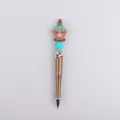 DIY beadable pen with cute highland cow silicone charm, colorful beads and metallic bronze body. - Turquoise Green