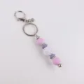 Silicone beaded keychain with sparkly rhinestone charm, stylish bag pendant and metal key ring. - Purple