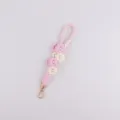 Handmade woven pearl flower phone lanyard and keychain in sweet pink and white colors. - Pink