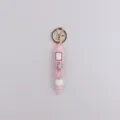 Portachiavi bottiglia di profumo in silicone ciondolo borsa simpatico accessorio per donne. - Flacone di profumo / Rosa