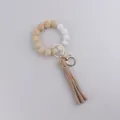Silicone wooden bead wristlet keychain with leather tassel stylish accessories for use - Beige