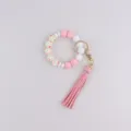 Silicone beaded keychain bracelet with pink leather tassel charm for women key ring holder. - Pink