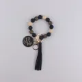 Cute silicone beaded wristlet keychain with black tassel and handmade wooden charm pendant. - Black