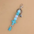 Blue silicone beaded keychain variant featuring a cross pendant, tassel and metal heart charm. - Blue