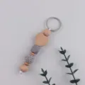 Handmade wooden heart keychain with grey silicone and crochet bead bag pendant charm. - Medium Grey