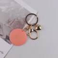 Handgemachte rosa runde Scheibe Schlüsselanhänger mit Gold Herz Anhänger süße Tasche Geschenk. - Herz Rosa