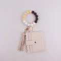 Porte-clés bracelet en perles de silicone avec porte-carte en cuir PU et belle option gland. - Blanc Cassé
