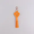 Bohemian orange woven heart tassel keychain, stylish handmade bag pendant for daily use. - Orange