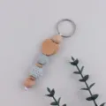 Handmade wooden bead keychain with heart charm, silicone bead, and cute bag pendant decor. - Grey Blue