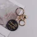 Handgemachter goldener Metall Schlüsselanhänger Taschenschmuck mit Holzplakette Herz. - Smiley Gesicht Schwarz