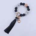 Llavero de pulsera de cuentas de silicona con borla de cuero y cuenta de madera mujer - Negro