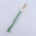 Handmade green macrame keychain with gold clasp, woven cotton cord keyring for daily use. - Bean Green