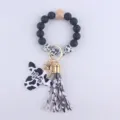 Silicone bead keychain bracelet with cow print wooden charm tassel fashion wristlet key chain - Black