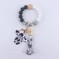 Cow print silicone bead keychain bracelet with wooden bead and Mama tassel pendant - White