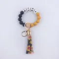 Silicone bead keychain bracelet with MAMA letters and sunflower tassel for daily use. - Sunflower