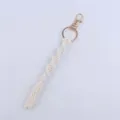 Handmade woven cotton rope keychain with gold clasp, beige color braided lanyard accessory. - Off White