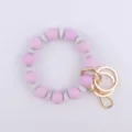 Pulsera llavero de cuentas de silicona con bloques violeta y gris y cierre dorado. - Violeta Claro