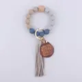 Silicone beaded keychain bracelet with leather tassel and MAMA wooden pendant for women. - Light Gray