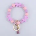Bracciale portachiavi con perline in silicone con fiocco e nappa simpatici - Viola