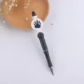 DIY beaded ballpoint pen detail shot featuring a cute black and white paw print silicone bead. - Bear Paw