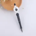 DIY beadable ballpoint pen with black body and unique skeleton hand charm bead, creative. - Finger