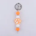 Llavero de cuentas de silicona con cuentas redondas naranja blanco y bonito colgante de pata - Naranja