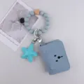Blue silicone bead bracelet card holder wallet keychain with starfish pendant and cute design. - Blue